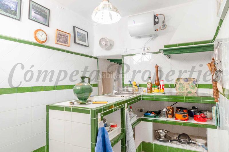 Foto f934d43b-ccc4-47a0-8b85-7b769d31bfcf. Casa pareada encantadora casa tradicional con terrazas y taller en el corazón en Cómpeta