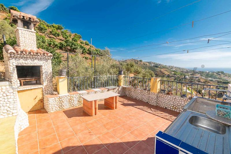 Foto 5c6a1ae6-0d52-4bd3-9314-5b391b0e2ae2. Masia amb xemeneia aparcament piscina a Torrox pueblo Torrox