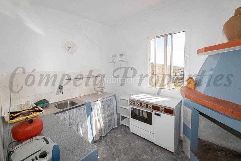 Foto c2bca7ae-34de-44a7-9703-44acc38d3f22. Masia amb xemeneia aparcament piscina a Torrox pueblo Torrox