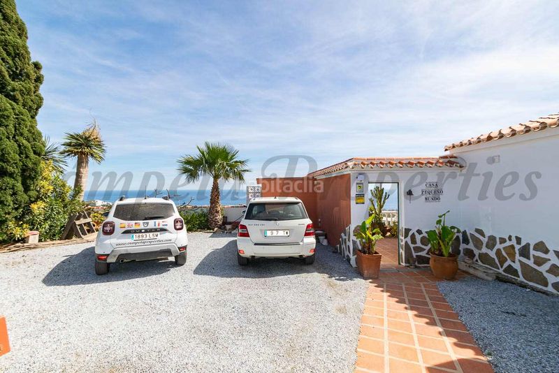 Foto e1ada31c-8df9-41d3-a1be-f53cd69980bc. Chalet avec cheminée chauffage parking piscine dans Torrox