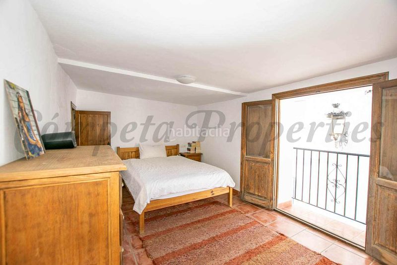 Foto aa0e2226-4339-4853-83c7-8aaf7ec2f846. Casa adossada a Cómpeta