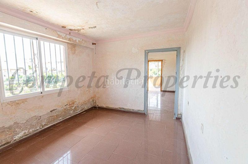 Foto c810c309-1b8a-4066-972e-6f52917d3198. Casa adossada amb aparcament a Cómpeta