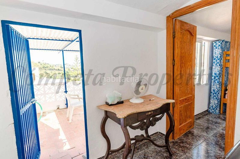 Foto 6fd40794-5519-4924-8c96-1b86ab590396. Casa adossada amb aparcament a Cómpeta
