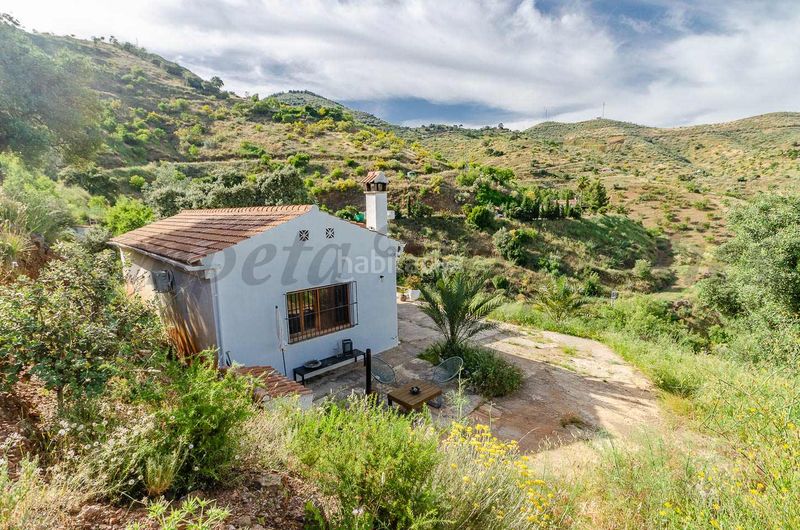 Foto f9670e54-9249-4bd9-9f57-6fa55c18d375. Masia amb xemeneia aparcament a Residencial Jardín Botánico Málaga