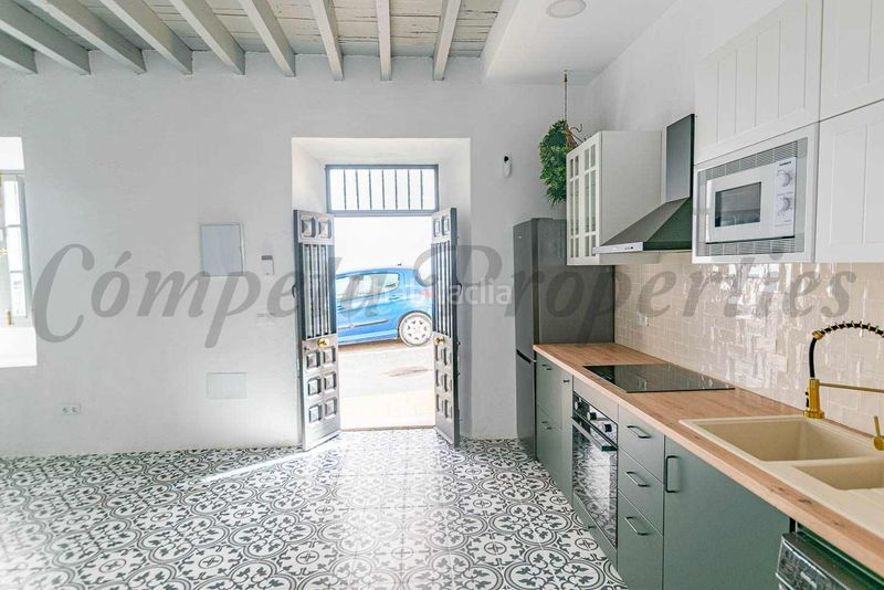 Foto 3557fa00-e59f-43d0-9b61-6d6793f625e5. Casa adossada amb xemeneia a Periana