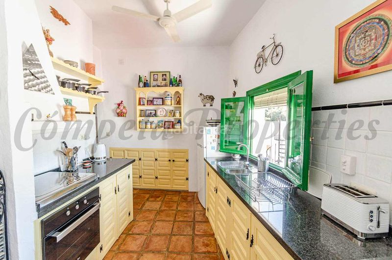 Foto b5eb428f-6232-4284-8ab2-ede475eda84d. Casa adossada a Cómpeta