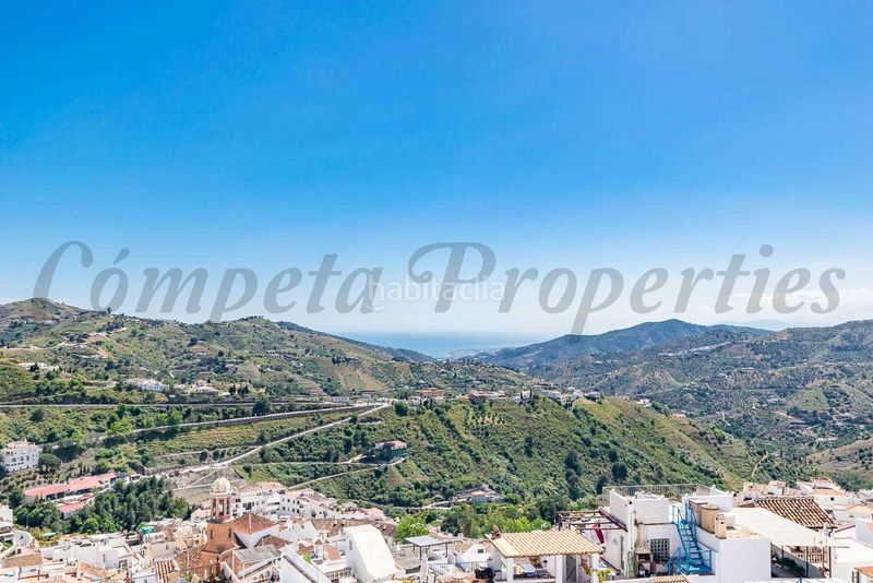 Foto b36f2e14-bf95-443b-90cc-fdd59c8f7258. Casa adossada a Cómpeta