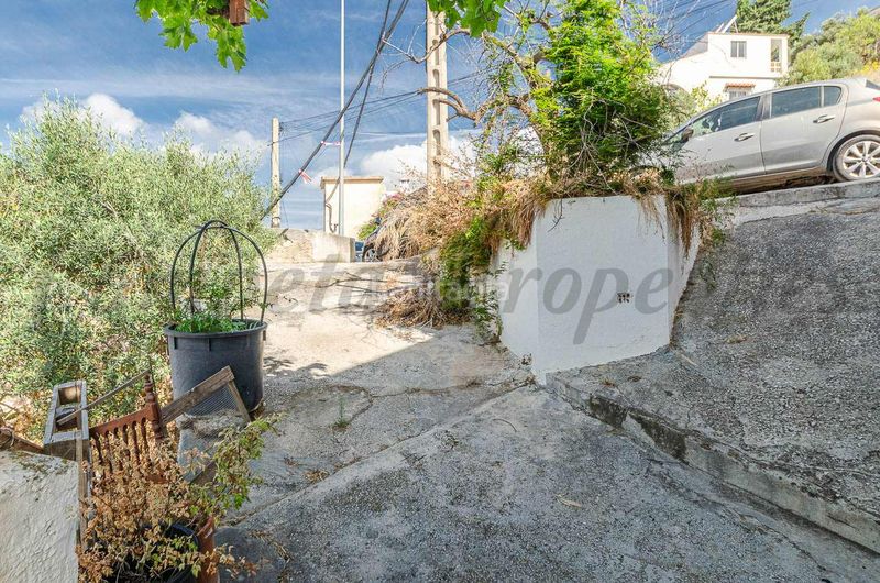 Foto b64333f0-d7a5-4ad6-85e4-097c04de3d8d. Casa amb xemeneia aparcament a Cómpeta