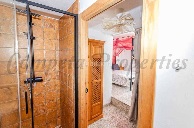 Foto dfc47cb7-63a7-450f-9456-2c99190a11f0. Casa adossada a Cómpeta