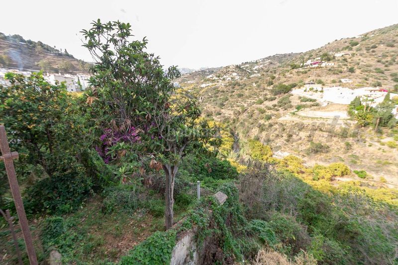 Foto 43cf0d32-f039-45ce-829f-771e5bae8579. Casa adossada amb xemeneia a Torrox pueblo Torrox