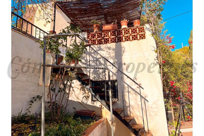 Foto 9833474c-8f3b-4903-9c00-8b7594170c80. Casa amb piscina a Hispanidad - Vivar Téllez Vélez - Málaga