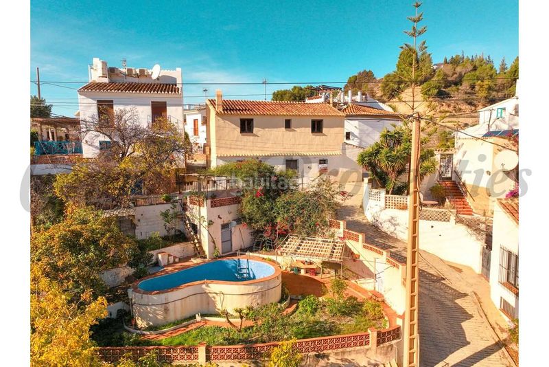 Foto ebe27c28-72e7-4ae6-9902-a7bcbef335f1. Casa amb piscina a Hispanidad - Vivar Téllez Vélez - Málaga