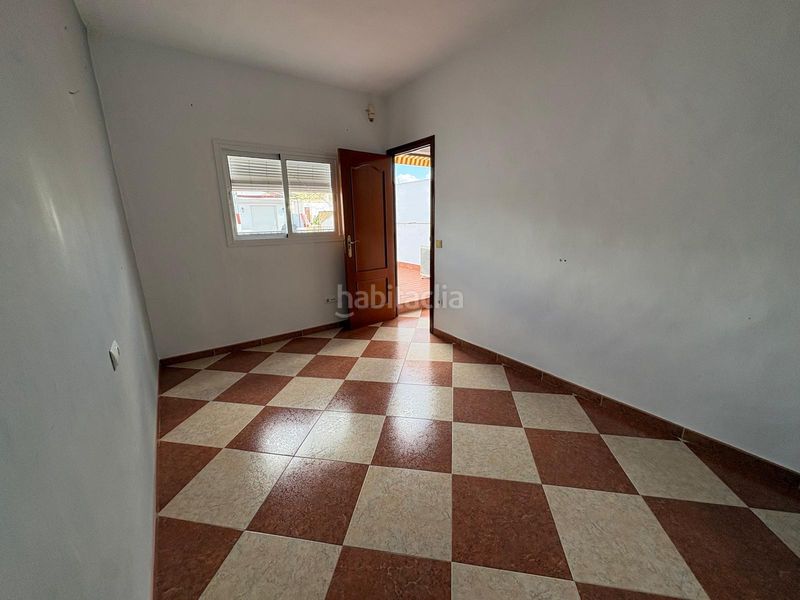Foto bae8af85-d7d1-4bd4-b0a9-21029a1dafc4. Casa amb aparcament a Morón de la Frontera