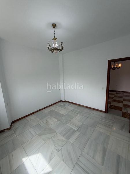 Foto e1670f0c-8e5e-4fd3-a8e9-7fc9c83fda88. Casa amb aparcament a Morón de la Frontera