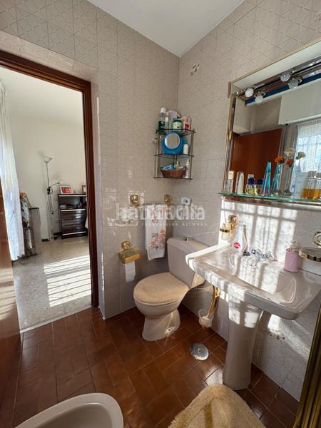 Foto 7a8cbeae-5eaf-4ea5-a4c1-13aaa17f4a0e. Casa aparellada amb aparcament a Sector 3 Getafe