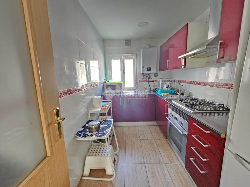 Foto 75f4f5b8-0181-49ff-a83e-88dd32184d91. Casa aparellada amb calefacció a San Isidro Madrid