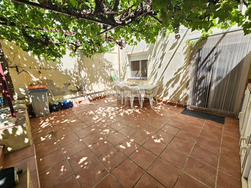 Foto bcc0c73a-0839-4c6b-870f-b400fd615766. Casa aparellada amb calefacció a San Isidro Madrid