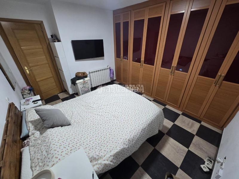 Foto e0db0b0f-2237-40e4-b2c2-f11ac88dae4a. Piso  en venta en San Fermín Madrid