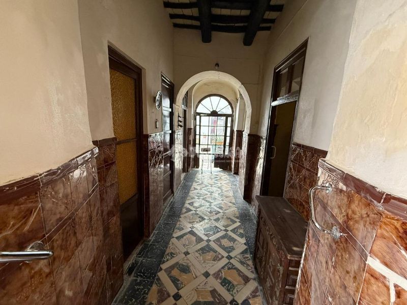Foto 1b2fa275-efb5-4254-b74e-848ed1fbf7ab. Casa aparellada a Arahal