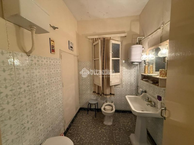 Foto 9ac1df4d-aab3-413b-a80b-1a8669c51688. Casa aparellada a Arahal