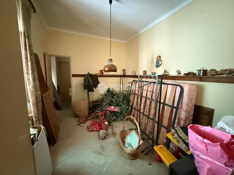 Foto c9d3c71d-e5af-4fb8-8e54-d444eb576a69. Casa aparellada a Arahal