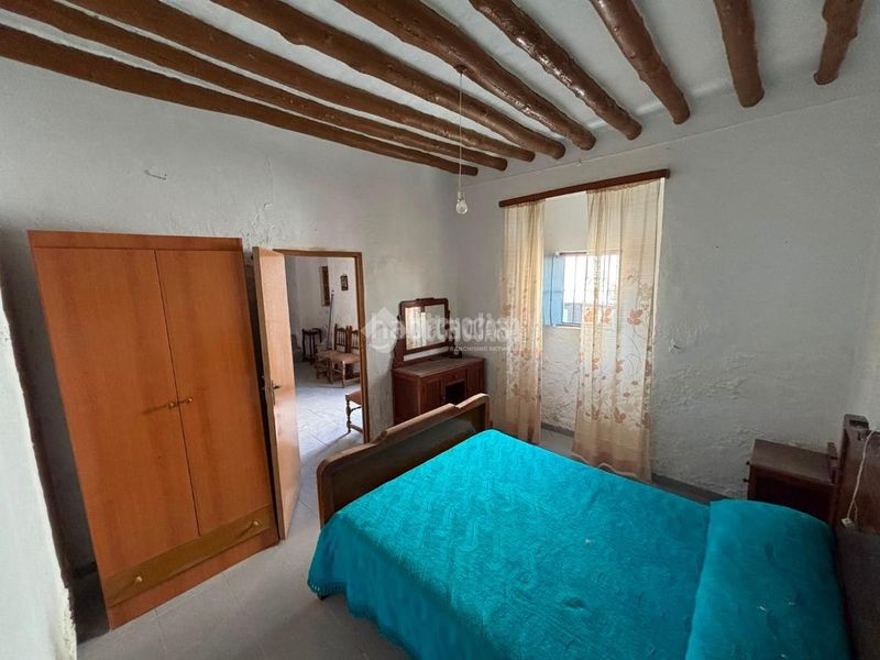 Foto 9b282756-c3d5-4d31-aa79-2901a1af7424. Casa aparellada a Osuna