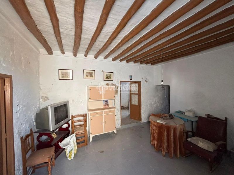 Foto b216de05-d2c0-46d6-972f-d353d8082d40. Casa aparellada a Osuna