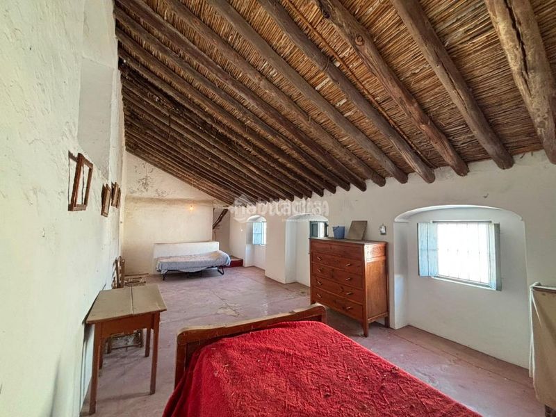 Foto d2b698bd-0a0b-4f02-a8fe-bf12464045e0. Casa aparellada a Osuna