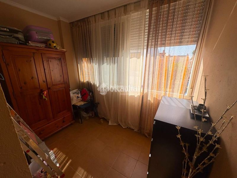 Foto cc4a4a8e-7a60-4835-849a-313bcd2d3e8b. Casa aparellada a Umbrete