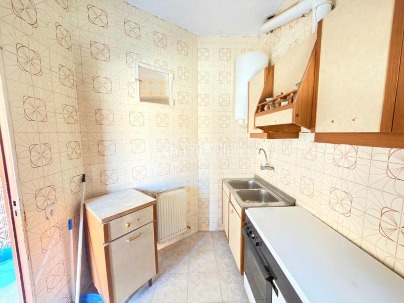 Foto 3e44a0c9-f535-4fda-8b28-30b1ffb3304c. Casa aparellada amb calefacció a Azucaica Toledo
