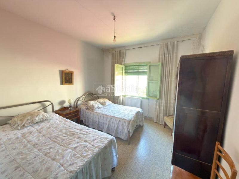 Foto 724fb54b-5fa2-48e0-aa48-d3a9808d5991. Casa aparellada amb calefacció a Azucaica Toledo
