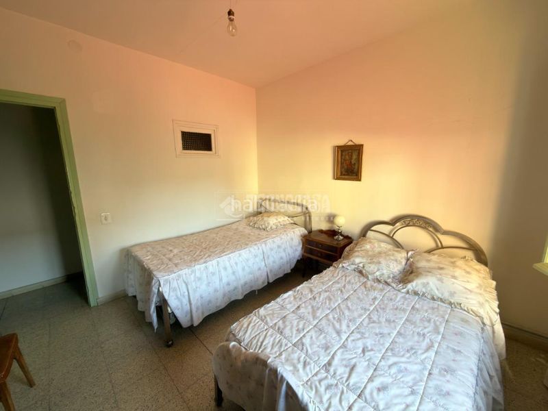 Foto e0effeb3-3049-45e8-954a-ea7cff9087e6. Casa aparellada amb calefacció a Azucaica Toledo