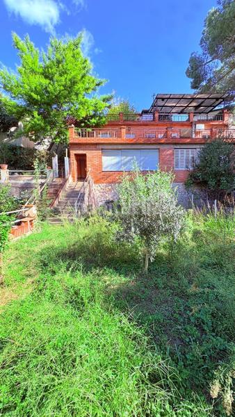 Foto 14c1accb-99dc-47d0-bcf7-79d7e77d52d3. Casa amb calefacció aparcament a Centre Sant Quirze del Vallès