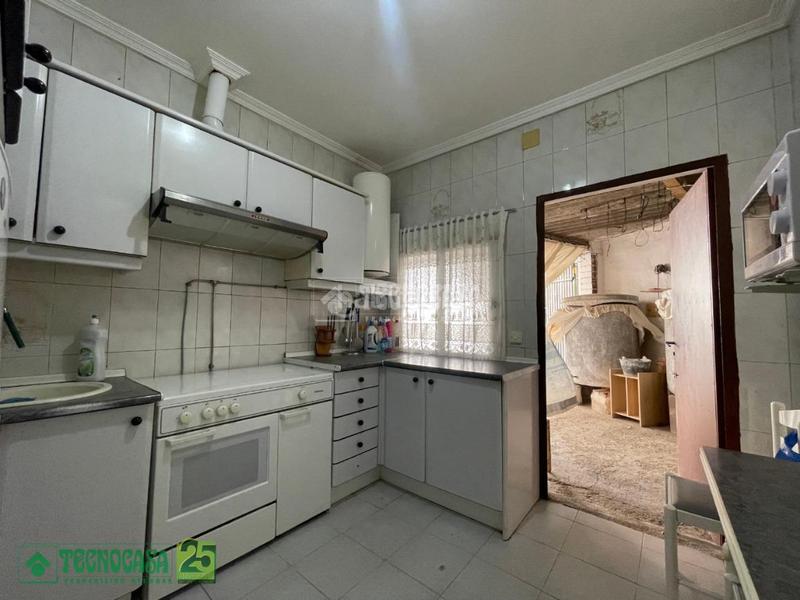 Foto 26bc3542-d318-4369-8bd1-48990c30d2a7. Casa pareada casa en venta en Lillo