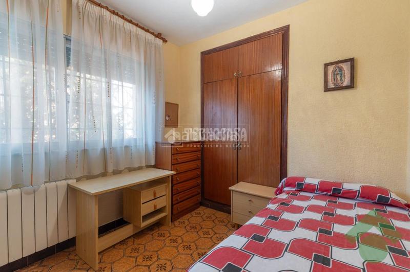 Foto b785dd70-ef53-4ca1-a9c2-42e584ce37ef. Casa  en venta en Barrio de Zaidín Granada