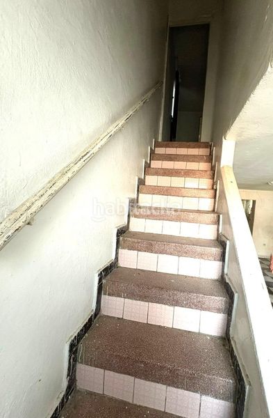 Foto 88672894-d027-4b99-b70c-b8e9d6710c00. Casa aparellada a Juan XXIII - Rochelambert Sevilla