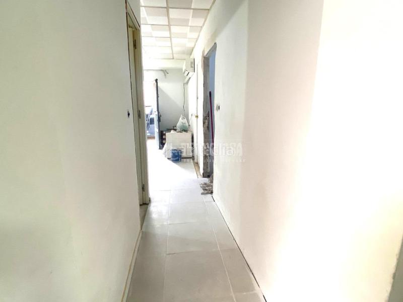 Foto c3eeb43a-ea5e-424a-8f60-0ab1bef4fa82. Casa aparellada a Amate Sevilla