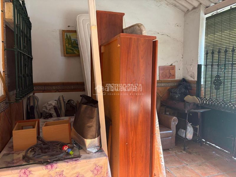 Foto 4ab4677c-a826-4186-a95a-d7fa4a147971. Casa aparellada a Amate Sevilla