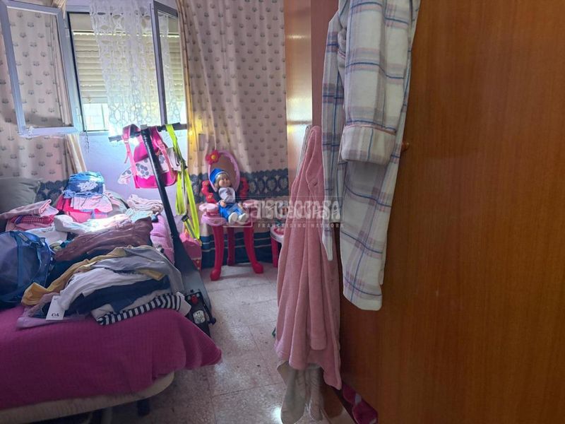 Foto f79714bd-d69a-4653-b911-8b503e3cfc74. Casa aparellada a Amate Sevilla