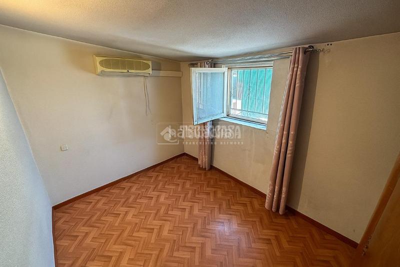 Foto 696f41ea-fa07-4dae-983c-e18ce0f7d803. Casa pareada casa en venta en Entrevías Madrid