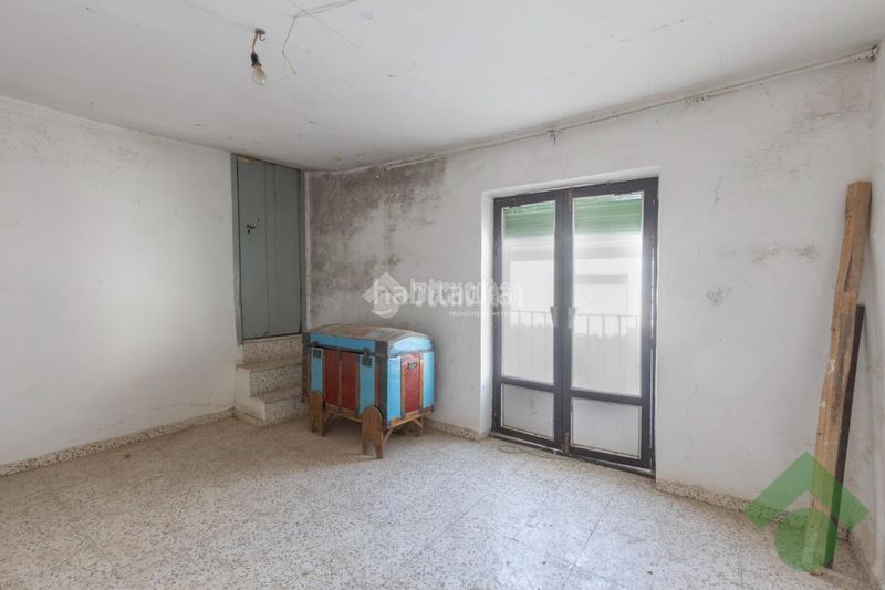 Foto 6d567312-0c08-4ed8-b671-bbb4b5bd8806. Casa aparellada amb aparcament a Colomera