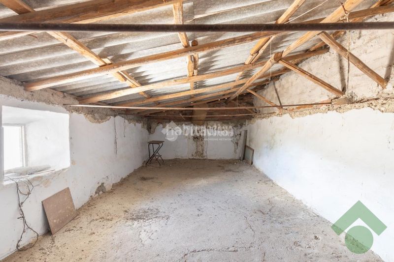 Foto cc5f1774-1489-4c9b-8f97-7695c76cbdf7. Casa aparellada amb aparcament a Colomera