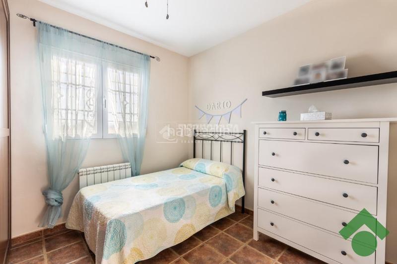 Foto cf54d2ab-26da-435f-8e88-39bbd9ffbe59. Casa  en venta en Atarfe
