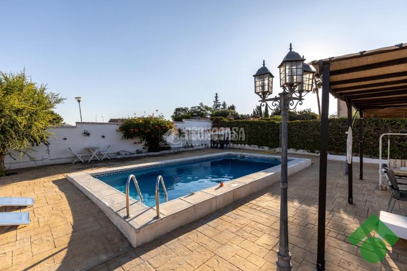 Foto 2eca2156-d5a2-413d-a677-15f42c87c06e. Casa  en venta en Atarfe