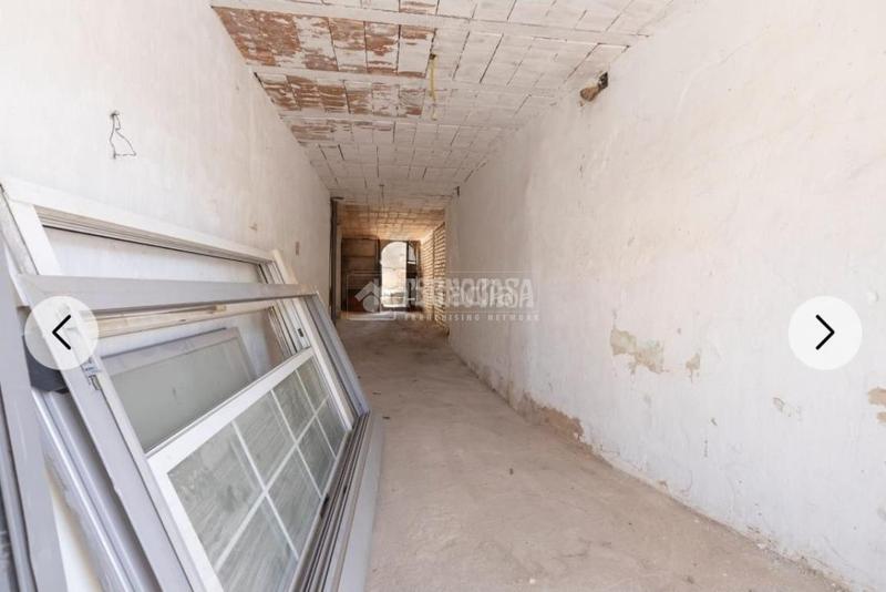 Foto 24622532-1f22-40dd-b9df-f6d6fe61a387. Casa aparellada a Albolote