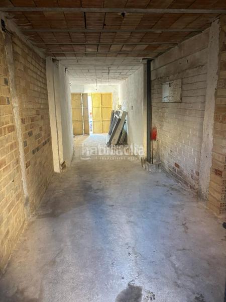 Foto 2d317378-856d-4b7c-8dd3-f8ea70dee4ec. Casa aparellada a Albolote