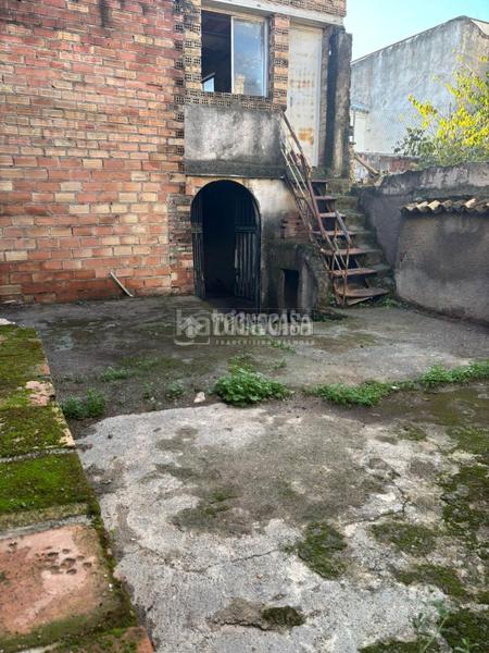 Foto 75d3f9d1-a55c-4a79-955a-6e3cd0ae6b19. Casa aparellada a Albolote