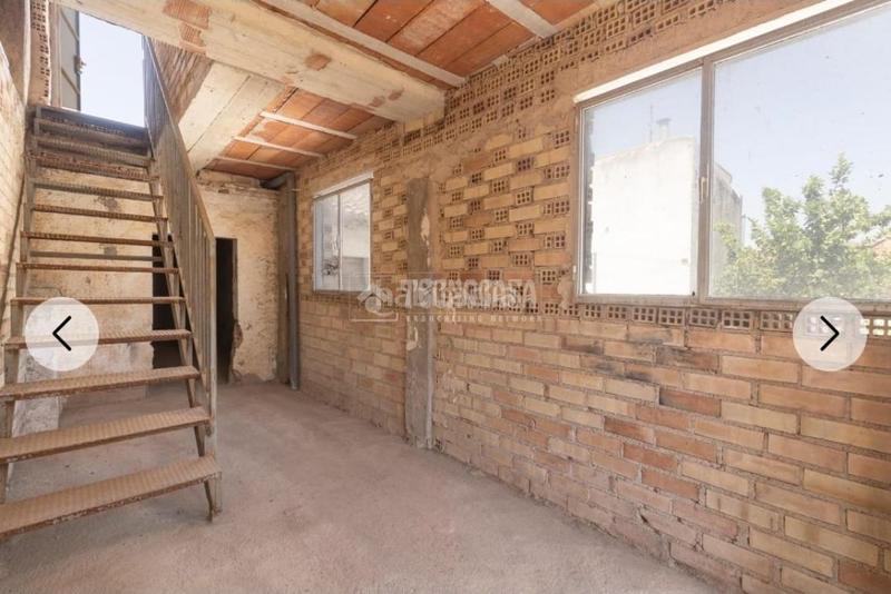 Foto aa0bcd99-146a-41f6-87e0-f76bbeca0196. Casa aparellada a Albolote