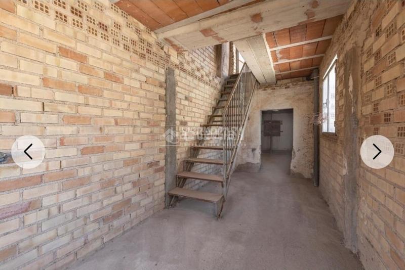 Foto d95985cf-9e64-498f-a12e-f5b8bca942fb. Casa aparellada a Albolote