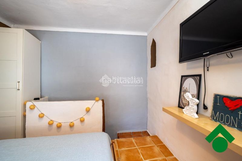 Foto 52293dc1-b683-4f73-8b21-75259dac6128. Casa aparellada a Íllora